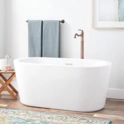 Best reviews of 😍 Signature Hardware Abescon 55 x 27 in. Freestanding Bathtub Center Drain in White with Brass Tones Trim 🧨