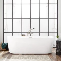 Brand new 😉 Signature Hardware Ashington 70 x 33-1/4 in. Freestanding Bathtub Center Drain in White with Oil Rubbed Bronze Trim 😍